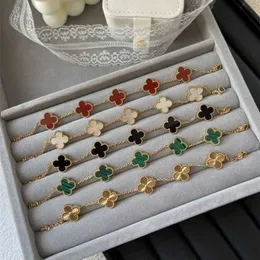 Designer Van Bracciale Four Leaf Clover Bracciali Cleef 2024 nuovo double-face quattro foglie cinque fiori donne fai da te in acciaio al titanio gioielli a mano regalo di lusso per le amiche