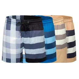 Pantaloncini da uomo taglie forti Pantaloncini da uomo Designer Pantaloncini estivi a righe sono eleganti pantaloncini da bagno Casual Sport Palestra Asciugatura rapida Pantaloni da spiaggia uomo Nero Taglia asiatica