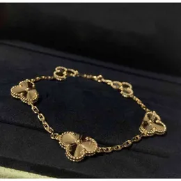 Anhänger-Armband mit Diamant und Nr. in 18 Karat vergoldetem 5-teiligem Blumendesign