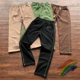 Pantalones para hombres Pantalones a rayas doradas para hombres Mujeres Casual Cordón Cinta Bordado Pantalones de chándal Pantalones T231121