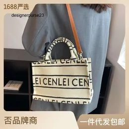 designer cel handbag Vegetable basket shopping bag vacation photo hand woven Womens New Canvas Printed Letter Handheld Tote Bag Small Fashion Trend One Should Z GK7O