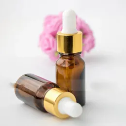 Gotes de conta -gotas marrons por atacado 10 ml de embalagem cosmética de vidro com tampa de ouro