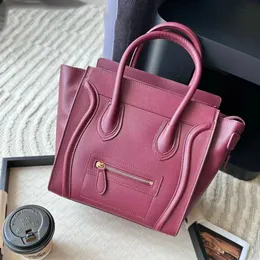 12a lüks çanta tasarımcısı çanta tasarımcısı tote çanta lüks tote çanta klasik çanta gerçek deri gülümseme yüz trapez çapraz vücut çantası iki boyut seçeneğiniz için cüzdan çantası