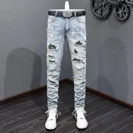 Jeans da uomo Streetwear Moda Uomo Retro Blu Elastico Elasticizzato Skinny Fit Strappato Perline Pantaloni firmati Hip Hop firmati