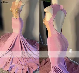 Abiti da ballo rosa aderenti aderenti per ragazze africane Collo sexy con scollo all'americana Strass di lusso Abiti da sera per occasioni speciali Abiti da cerimonia lunghi senza schienale con sirena CL2191