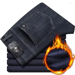 Męskie dżinsy Wysokiej klasy mężczyźni polaru termiczne 2023 Zimowy biznes prosty plus aksamitne gęste dżinsowe spodnie męskie miękkie ciepłe spodnie