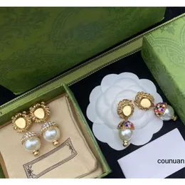 Designerörhängen Öronbrickor dingle ljuskrona Fashion Gold Stud örhängen hänge för kvinnors Luxurys smycken Pearl Lion Ear Ring Ladies Ear Studs Retro Högkvalitativ D