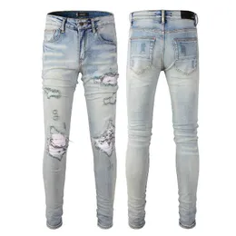 Designerkläder denim Pants Amiiri 2023 Ny trend mode Slim Fit Small Foot Elastic Patch Blue Jeans Men's Amiiri Fashion Märke nödläge rippad mager