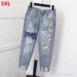 Kvinnors jeans plus storlek Kvinnors niopunktshål Denim Harem Pants Lose Begar Ankle-Length Cross Pants Ripped Jeans for Women 230424