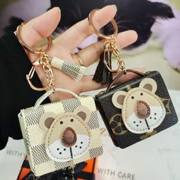 Animal Keychain Bluetooth Earphones AirPods Case Key Rings, Brown Flower Lion Head Storage Bag Keyring Accessories, Creative Wallet Car Keys Pendant Holder