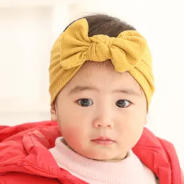 赤ちゃんの女の子のヘアアクセサリーのための新生児ニットボウヘッドバンドKnotbow Elastic Hair Bands Kid Ribbed Bow Turban Headラップ