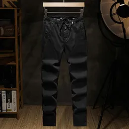 Tute da uomo Elmsk Primavera Pantaloni casual Cotone Vestibilità ampia Tubo dritto Personalità giovanile Tendenza Elastico Versatile Sol