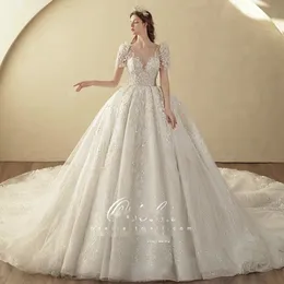 luxury Princess Ball Gown Wedding Dress new 2023 Dubai shiny gown Sequined sweatheart Neck Long Sleeve Beads sweep train Bridal Gowns Crystal Bride robes de mariee