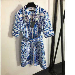 23ss vestido feminino roupas de grife feminina azul e branco porcelana estampada cinto dobrado na cintura contas pregadas lapela zíper vestido de manga curta roupas femininas a1