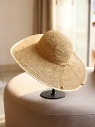 Cappelli a tesa larga da donna intrecciati a mano estate rafia bordo largo moda protezione solare paglia casual