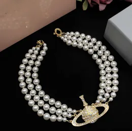 Naszyjniki wiszące projektant Vivian Chokers luksusowe kobiety biżuteria metalowy naszyjnik perłowy cjeeweler Westwood z pudełkiem 38ess