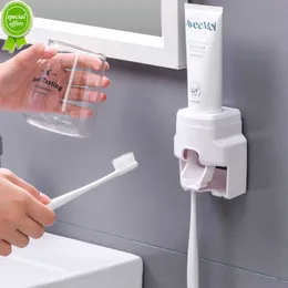 Ny 1 st väggmontering automatisk tandkräm dispenser plast ingen stansning tandkräm pressare små hållare badrumstillbehör prylar