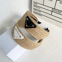 Designer Inverterad triangel pannband