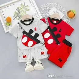 2023 Summer Kids Designer одежда детская спортивная костюма наряды детские мальчики для девочек мультипликационная футболка шорты 2pc/set малыша повседневная одежда Sweet Cuite