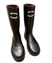 Nueva moda Botas de cuero negras para mujer Lluvia Imprimir Suela Zapatos de diseñador Zapatos cómodos antideslizantes UGGsityvfr