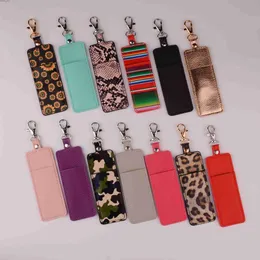 Nyckelringar 2022 Ny enkel läppstiftpåse Keychain PU Läder Solros Leopard Bag Key Chain Gifts Accessory Lip Balm Lipsticks Keyrings J230427