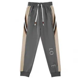 Designer de moda esportiva masculina calças casuais tudo-em-um macacão quadra de basquete sweatpants dupla face com viagens diárias