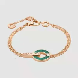 클래식 패션 작은 레드 맨 구리 동전 팔찌 여성 금 도금 세련된 맞춤형 색상 보존 풀 다이아몬드 라이트 디자인 감각