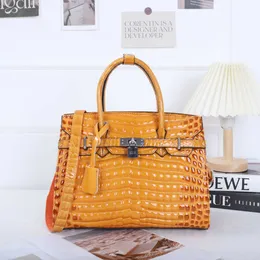 Luxury Designer tote Bags Hrem Brikis's online store 2023 New Womens Bag Arch Bead Stone Pattern Highlighting Temperament Handbag Can Be With Real Logo