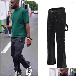 Męskie dżinsy dżinsy dżinsy czarne szerokie nogi streetwearki Flare Pants Hip Hop Splashed Ink Spodni Mężczyźni Pracuj w Slim Fit Dżins do dostawy upu