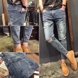 Брюки оптом 2022 Подростковые джинсовые джинсы Мужские модные брендовые укороченные брюки Корейские дырки Социальный парень-шаровары Тонкие модные брюки-карандаш