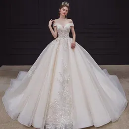 Off Shoulder Princess Ball Gown Wedding Dress 2023 Sequined V Neck Long Train Pärlor Luxury Bridal Gowns Crystal Bride Shiny Gown New Sexy Plus Size Robes de Mariee