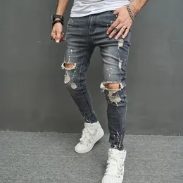 Mężczyźni s dżinsy mężczyźni stylowe rozryte chude spodnie ołówkowe streetwear męskie dziury hip -hopowe rozciągnięcie szczupły dżinsowe spodnie 231129