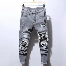 Jeans femininos homens bordados algodão elástico rasgado magro de alta qualidade hip hop buraco preto fino ajuste calças jeans oversize 231129
