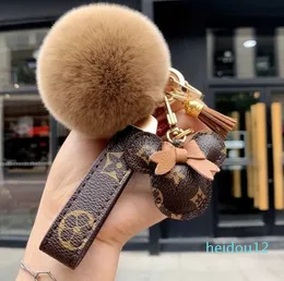 keychain bear head leather fur ball pendant key chain bow car pendant metal fashion personality creative cute