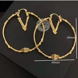Titanium Stud Earrings Gold Luxury Ebing Diamond Clover Womens Designer Luxury Men أقراط Westwood Stud Medusa Schmuck Bijoux المجوهرات الزفاف
