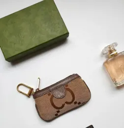 7A Kalite Para Çantası Anahtar Cüzdan Pochette Küçük Koruma Tasarımcısı Moda Ruj Çantaları Kadınlar Erkek Anahtar Ring Kredi Kartı Tutucu Lüks Mini Cüzdanlar Çanta Charm 7 Renk