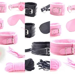 Nxy Bondage 9pcs Metal Tail Butt Plug anale Manette per le orecchie Whip Ball Gag Bdsm Set Giocattoli erotici per sesso Prodotto per donna adulta Coppia 220421