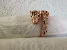 Berühmter rosévergoldeter Zirkon-Panther-Fingerring, verstellbarer Doppel-Leopardenkopf-Ring für Damen und Herren, grüne Augen, Panthere-Schmuck