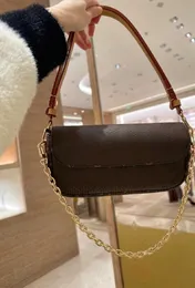 Portafoglio in tela con monogramma su catena: borsa a tracolla di lusso per donna