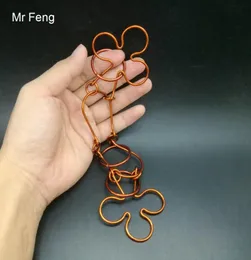 Flower Shape Red Copper Wire Puzzle Hand Made Toy Model Number H383 3439227