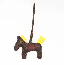 Real Sheepskin Leather Horse Bag Charm Keychain H￶gkvalitativ ponny Pendant Classic Handbag Ornament Cartoon Flower M￶nster Brand Keychains
