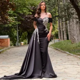 2023 Sexy Black Evening Dresses Wear Mermaid Off Shoulder Short Sleeves Silver Crystal Beading Overskirts Floor Length Satin Open Back Party Dress Prom Gowns