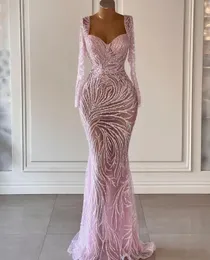 Pink Mermaid Prom Dresses Long Sleeves V Neck 3D Lace Hollow Sexy Appliques Sparkly Sequins Beaded Floor Length Celebrity Evening Dresses Plus Size Custom Made