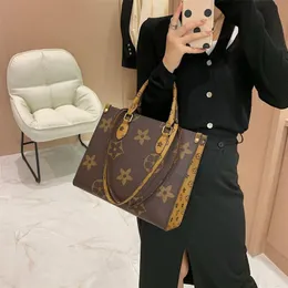 2023 Top Luxurys Designer Onthego مزجعة حقيبة زهرة أسود حقيبة نساء يحمل الكتف حقيبة يد جلدية حتى