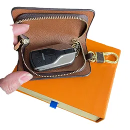 Neue klassische Designer -Buchstaben Brieftasche Schlüsselbeutel Keyring Mode Geldbeutel Anhänger Autokette Charm Brown Blumenbox