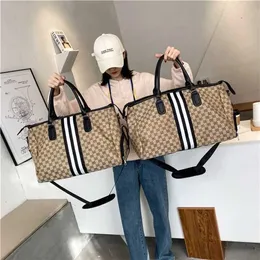 Cheap Purses Clearance 60% Off Oxford cloth high capacity travel bag women's Waterproof Black and white strip men's sports Bag Fashion Handbags