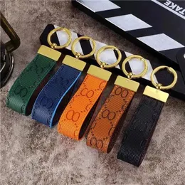 2023 Top Luxury KeyChain Men Women Bag Hanging Buckle Keychains Auto Car Waist Handmade G Leather Embossed Holder Lover fashion Keyring 10 Color