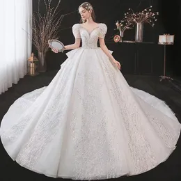 Abito da sposa Altri abiti Principessa di lusso Maniche a sbuffo Scollo rotondo Pizzo Perline Paillettes Cielo stellato lucido Coda illusione Abito da sposa francese