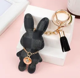 LUOZZY 2-Pack Easter Bunny Keychains - Cute Rabbit & Flowers Key Rings For Bag, Backpack & Gift