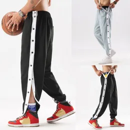 Мужские брюки с сеть красной разрывы баскетбольные повседневные тренировки разогреть открытые спортивные штаны с карманами в складе 230217